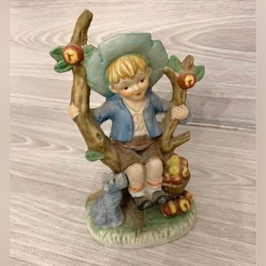 Vintage Boy on swing with Schnauzer Dog Figurine Japan 6" T. Good condition. No